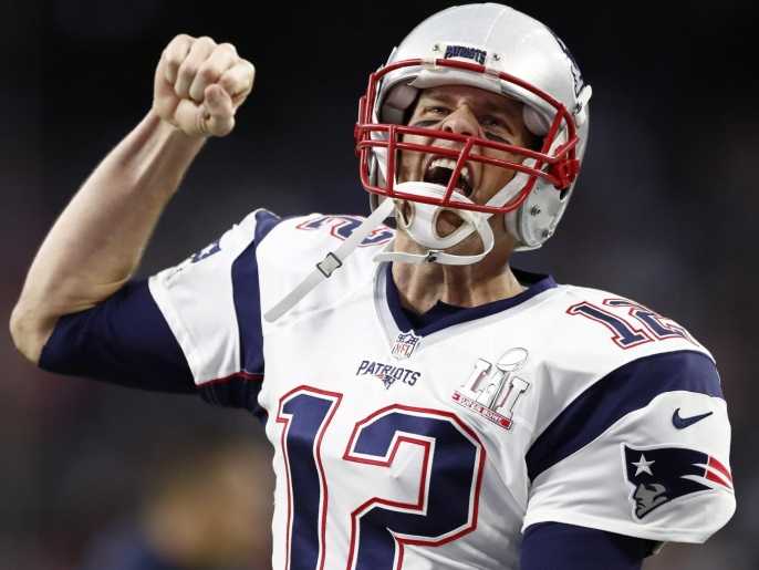 epaselect epa05773747 New England Patriots quarterback Tom Brady reacts while running on the field before the start of Super Bowl LI at NRG Stadium in Houston, Texas, USA, 05 February 2017. The AFC Champion Patriots play the NFC Champion Atlanta Falcons in the National Football League's annual championship game.