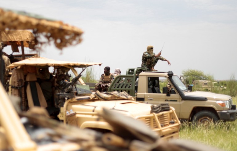 Malian soldiers are pictured during a patrol with soldiers from the new Takuba force near Niger border in Dansongo Circle, Mali August 23, 2021. Picture taken August 23, 2021. REUTERS/ Paul Lorgerie