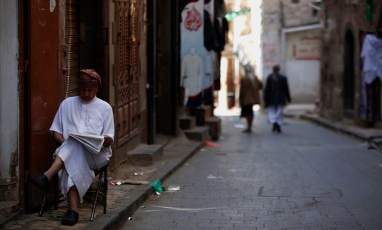 ارشيف A Yemeni man reads a newspaper as he sits in front of his shop at a market ahead of the Muslim holy month of Ramadan in the old city of Sanaa, Yemen, Wednesday, June 17, 2015. Muslims throughout the world mark the month of Ramadan, the holiest month in the Islamic calendar, with dawn to dusk fasting. (AP Photo/Hani Mohammed)