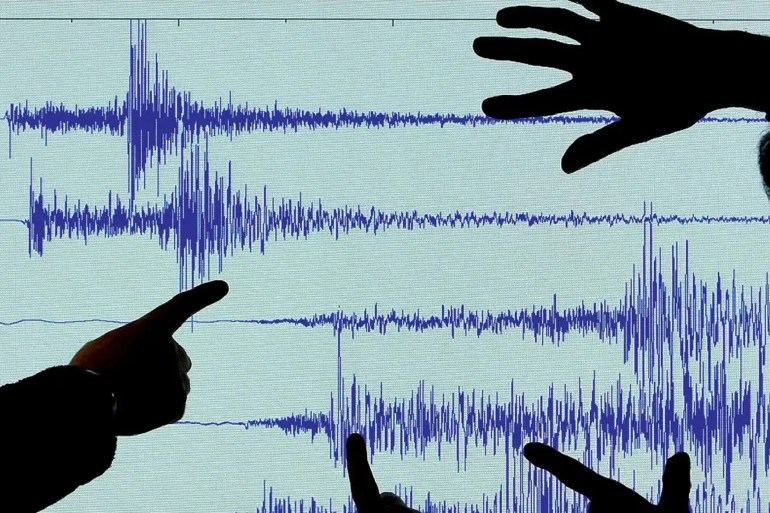 EDINBURGH, UNITED KINGDOM - FEBRUARY 27: Staff at the British Geological Survey, in Edinburgh look at the graph showing the earthquake which occurred at Market Rasen in North East Lincolnshire February 27, 2008 in Scotland. The tremor the biggest in the UK for nearly 25 years was felt by people as far away as Cumbria and also in the Midlands and London. (Photo by Jeff J Mitchell/Getty Images)