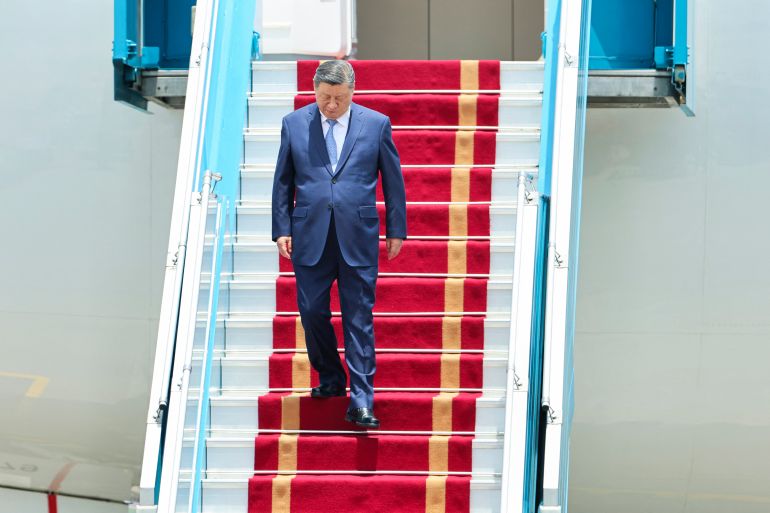 Chinese President Xi Jinping arrives for a two-day state visit at Hanoi's Noi Bai International Airport in Hanoi on April 14, 2025. His tour of Southeast Asia will also see him visit Malaysia and Cambodia as Beijing seeks to strengthen regional trade ties and offset the impact of huge tariffs unleashed by his US counterpart. (Photo by Athit Perawongmetha / POOL / AFP)